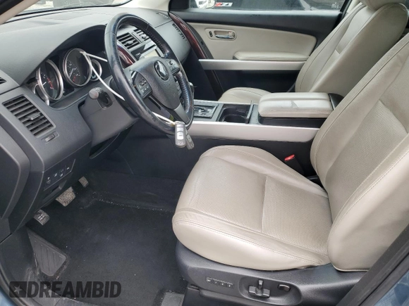 2015 Mazda CX-9 Grand Touring z VIN JM3TB2DAXF0448042, wystawiony jako Copart lot #53620085 z przebiegiem 134 386 mil mil oraz Szkoda całkowita • Salvage title. Historia ofert i sprzedaży dostępna na DreamBid. Obrazek 7.