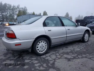 1996 Honda Accord EX with VIN 1HGCD5667TA197002, listed as a Copart auction lot 76937404 with 267,287 mi miles and Clean Title. Bid and sale history available at carsss.com. Image 3.
