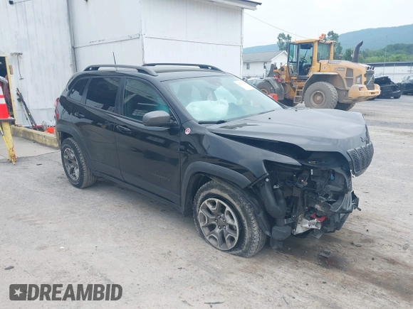 2021 Jeep Cherokee Trailhawk with VIN 1C4PJMBX0MD167941, listed as a IAAI auction lot 42507379 with 70,414 mi miles and . Bid and sale history available at DreamBid. Image 1.