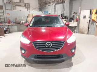 2016 Mazda CX-5 Grand Touring with VIN JM3KE4DY6G0690923, listed as a IAAI auction lot 41875553 with 179,489 mi miles. Bid and sale history available at carsss.com. Image 12.
