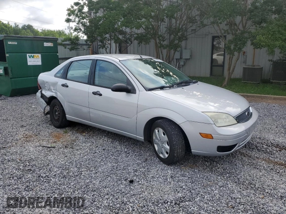 2005 Ford Focus S with VIN 1FAFP34N55W115653, listed as a Copart auction lot 63043315 with 110,593 mi miles and Salvage title. Bid and sale history available at DreamBid. Image 4.