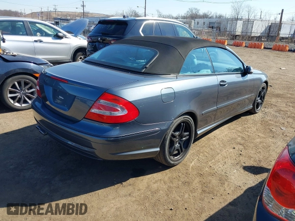 2005 Mercedes-Benz CLK-Class AMG with VIN WDBTK76G35T040484, listed as a IAAI auction lot 41741145 with 36,299 mi miles. Bid and sale history available at carsss.com. Image 4.