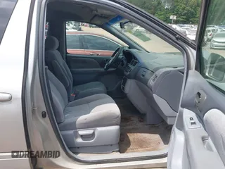 2003 Toyota Sienna LE with VIN 4T3ZF13C83U542299, listed as a IAAI auction lot 42121993 with 229,609 mi miles. Bid and sale history available at carsss.com. Image 5.