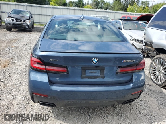 2023 BMW 5 Series M550i xDrive z VIN WBA13BK02PCN82953, wystawiony jako Copart lot #68124264 z przebiegiem 10 010 mil mil oraz Szkoda całkowita • Salvage title. Historia ofert i sprzedaży dostępna na DreamBid. Obrazek 6.