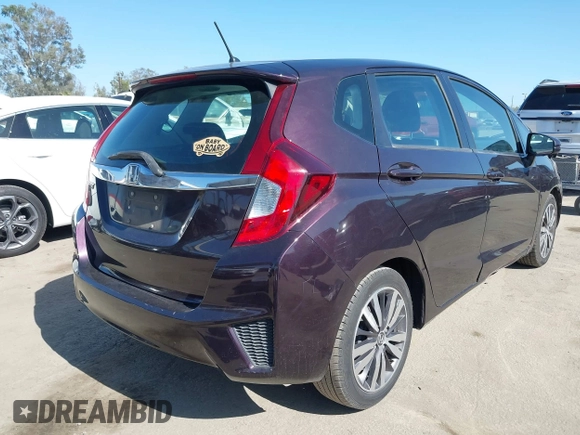 2015 Honda Fit EX-L z VIN 3HGGK5H80FM725959, wystawiony jako IAAI lot #42526513 z przebiegiem 110 885 mil mil oraz . Historia ofert i sprzedaży dostępna na DreamBid. Obrazek 4.