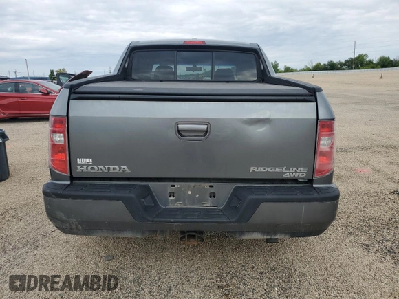 2009 Honda Ridgeline RTL z VIN 5FPYK16569B103645, wystawiony jako Copart lot #58300625 z przebiegiem 103 195 mil mil oraz Szkoda całkowita • Salvage title. Historia ofert i sprzedaży dostępna na DreamBid. Obrazek 6.