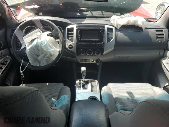 2015 Toyota Tacoma with VIN 3TMLU4EN9FM165421, listed as a Copart auction lot 58547985 with 136,372 mi miles and Salvage title. Bid and sale history available at DreamBid. Image 8.