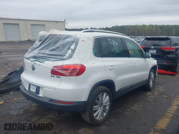2012 Volkswagen Tiguan SEL with VIN WVGAV7AX0CW507942, listed as a IAAI auction lot 41854498 with 177,117 mi miles and . Bid and sale history available at DreamBid. Image 4.