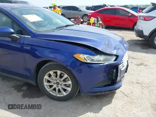 2016 Ford Fusion S z VIN 3FA6P0G7XGR263248, wystawiony jako IAAI lot #42020410 z przebiegiem 167 430 mil mil oraz . Historia ofert i sprzedaży dostępna na DreamBid. Obrazek 6.