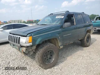 1997 Jeep Grand Cherokee Laredo с VIN 1J4GZ58SXVC595012, выставлен на аукционе Copart как лот 59746655 с пробегом Не указан миль и Списание • Salvage title. История ставок и продаж доступна на DreamBid. Изображение 1.
