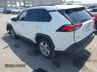 2021 Toyota RAV4 XLE with VIN JTMW1RFV2MD063839, listed as a IAAI auction lot 42406891 with 69,490 mi miles and . Bid and sale history available at DreamBid. Image 3.