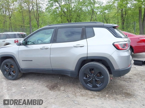 2019 Jeep Compass Latitude with VIN 3C4NJDBB5KT782858, listed as a IAAI auction lot 42263404 with 64,315 mi miles and . Bid and sale history available at DreamBid. Image 13.