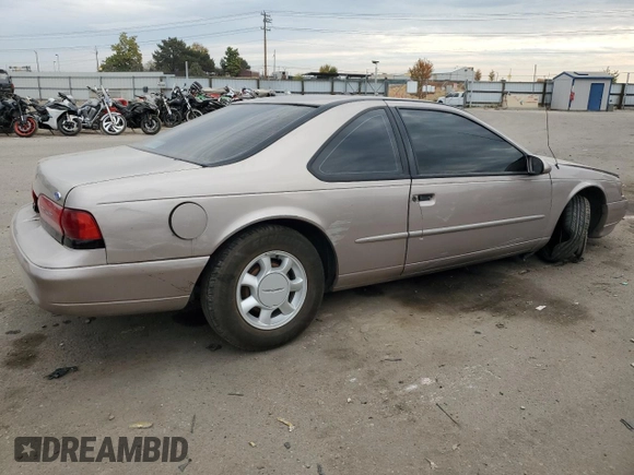 1994 Ford Thunderbird LX with VIN 1FALP6241RH110457, listed as a Copart auction lot 76384254 with 54,653 mi miles and Salvage Title. Bid and sale history available at DreamBid. Image 3.