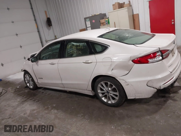 2019 Ford Fusion Hybrid SEL with VIN 3FA6P0MU8KR272811, listed as a IAAI auction lot 41705282 with 56,565 mi miles. Bid and sale history available at carsss.com. Image 14.