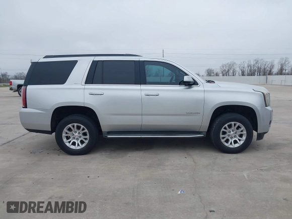 2015 GMC Yukon SLT with VIN 1GKS1BKC3FR253184, listed as a IAAI auction lot 41574610 with 152,543 mi miles. Bid and sale history available at carsss.com. Image 13.