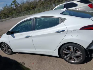 2015 Hyundai Elantra SE z VIN 5NPDH4AE7FH570097, wystawiony jako IAAI lot #41577252 z przebiegiem 135 219 mil mil oraz . Historia ofert i sprzedaży dostępna na DreamBid. Obrazek 14.