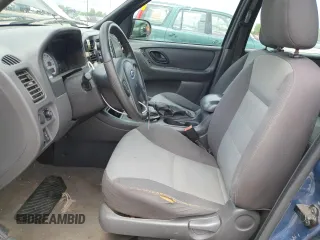 2005 Ford Escape XLS Value with VIN 1FMYU92Z95DA22100, listed as a Copart auction lot 57874705 with 192,057 mi miles and Salvage title. Bid and sale history available at DreamBid. Image 7.