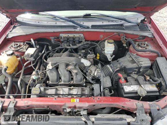 2005 Ford Escape Limited with VIN 1FMYU04165KA33277, listed as a Copart auction lot 54407625 with 217,317 mi miles and Salvage title. Bid and sale history available at DreamBid. Image 11.