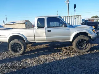 2003 Toyota Tacoma with VIN 5TEWN72N93Z240875, listed as a IAAI auction lot 41539686 with 169,249 mi miles. Bid and sale history available at carsss.com. Image 14.