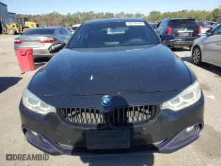 2015 BMW 4 Series 428i xDrive with VIN WBA4C9C51FD331771, listed as a Copart auction lot 82763504 with 124,945 mi miles and Salvage Title. Bid and sale history available at carsss.com. Image 5.