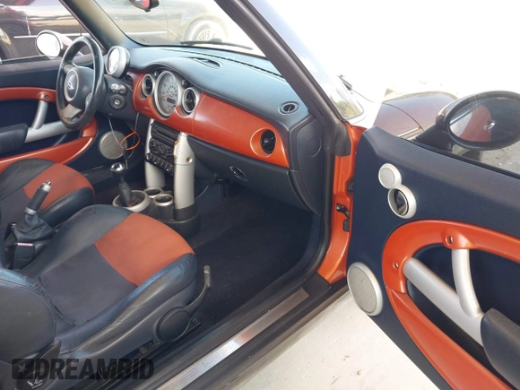 2005 MINI Convertible with VIN WMWRF334X5TF61026, listed as a IAAI auction lot 42125720 with 117,908 mi miles and . Bid and sale history available at DreamBid. Image 5.