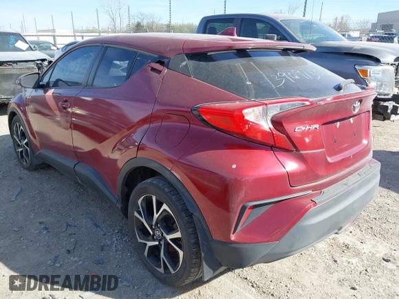 2018 Toyota C-HR XLE with VIN NMTKHMBX3JR059057, listed as a IAAI auction lot 41810801 with 124,246 mi miles. Bid and sale history available at carsss.com. Image 3.