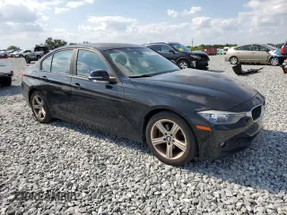 2014 BMW 3 Series 320i with VIN WBA3B1G50ENT00580, listed as a Copart auction lot 53697085 with 128,925 mi miles and Clean Title. Bid and sale history available at carsss.com. Image 4.