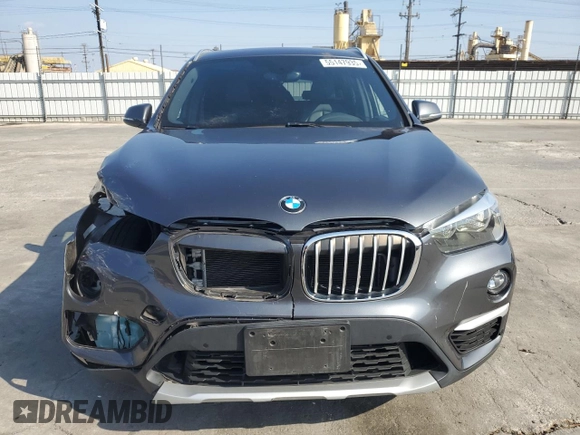 2018 BMW X1 sDrive28i with VIN WBXHU7C35J5L09783, listed as a Copart auction lot 55147935 with 37,114 mi miles and Salvage Title. Bid and sale history available at DreamBid. Image 5.