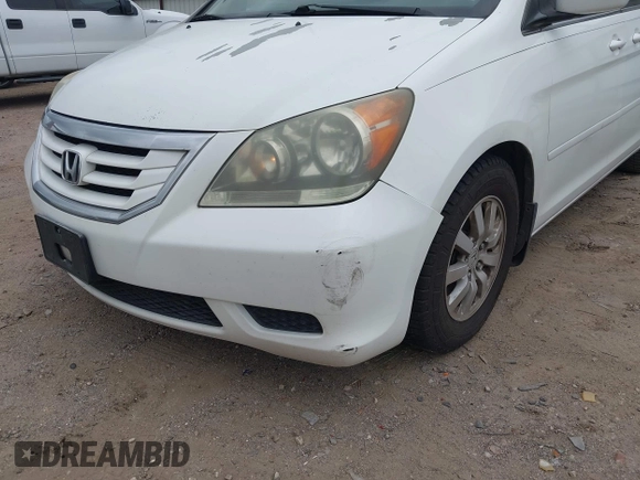 2010 Honda Odyssey EX-L z VIN 5FNRL3H78AB030254, wystawiony jako IAAI lot #42742510 z przebiegiem 277 913 mil mil oraz . Historia ofert i sprzedaży dostępna na DreamBid. Obrazek 6.