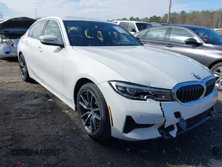 2022 BMW 3 Series 330i with VIN WBA5R1C01NFM20381, listed as a IAAI auction lot 41579020 with 37,874 mi miles. Bid and sale history available at carsss.com. Image 1.