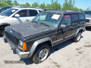 1995 Jeep Cherokee Country z VIN 1J4FJ78S9SL666002, wystawiony jako IAAI lot #42313644 z przebiegiem 226 914 mil mil oraz . Historia ofert i sprzedaży dostępna na DreamBid. Obrazek 2.