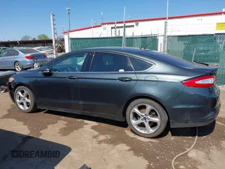 2015 Ford Fusion SE with VIN 3FA6P0H78FR299257, listed as a IAAI auction lot 42104541 with 122,986 mi miles. Bid and sale history available at carsss.com. Image 14.