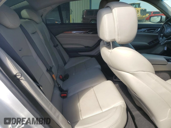 2014 Cadillac CTS Luxury RWD z VIN 1G6AR5SX0E0134728, wystawiony jako Copart lot #50812825 z przebiegiem 52 573 mil mil oraz Szkoda całkowita • Salvage title. Historia ofert i sprzedaży dostępna na DreamBid. Obrazek 11.