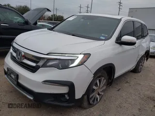 2020 Honda Pilot EX-L with VIN 5FNYF5H55LB029238, listed as a IAAI auction lot 41330490 with 116,787 mi miles. Bid and sale history available at carsss.com. Image 2.