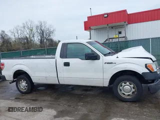 2014 Ford F-150 XL with VIN 1FTMF1CM0EKF70113, listed as a IAAI auction lot 41982424 with 150,007 mi miles. Bid and sale history available at carsss.com. Image 13.