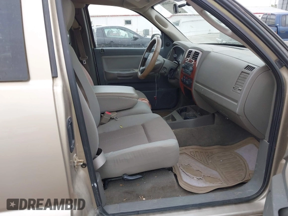 2005 Dodge Dakota SLT with VIN 1D7HE42K75S176815, listed as a IAAI auction lot 42160096 with 121,671 mi miles and . Bid and sale history available at carsss.com. Image 5.