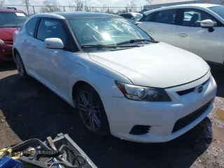 2013 Scion tC with VIN JTKJF5C70D3055764, listed as a IAAI auction lot 41895086 with 153,656 mi miles. Bid and sale history available at carsss.com. Image 1.