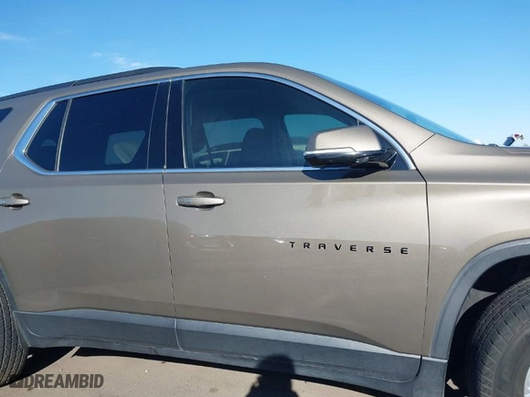 2020 Chevrolet Traverse LT Cloth with VIN 1GNERGKW7LJ112127, listed as a IAAI auction lot 41836681 with 98,575 mi miles. Bid and sale history available at carsss.com. Image 13.