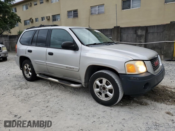 2005 GMC Envoy SLT with VIN 1GKDS13S352101385, listed as a Copart auction lot 89271025 with 165,670 mi miles and Salvage Title. Bid and sale history available at carsss.com. Image 4.