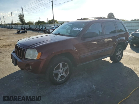 2007 Jeep Grand Cherokee Laredo z VIN 1J8GR48K07C649302, wystawiony jako Copart lot #82167894 z przebiegiem 255 780 mil mil oraz Czysty tytuł • Clean title. Historia ofert i sprzedaży dostępna na DreamBid. Obrazek 1.
