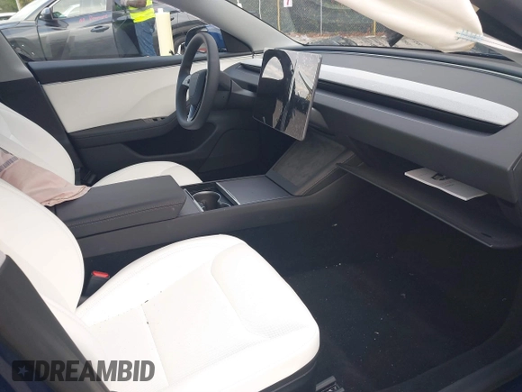 2025 Tesla Model 3 Long Range with VIN 5YJ3E1EA2SF919461, listed as a IAAI auction lot 41672494 with 777 mi miles and . Bid and sale history available at DreamBid. Image 5.