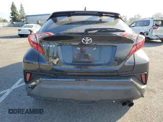 2018 Toyota C-HR XLE with VIN NMTKHMBX7JR022593, listed as a Copart auction lot 70659634 with 106,692 mi miles and Salvage Title. Bid and sale history available at carsss.com. Image 6.