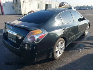 2010 Nissan Altima 3.5 SR with VIN 1N4BL2AP2AN527586, listed as a IAAI auction lot 41454445 with 184,955 mi miles. Bid and sale history available at carsss.com. Image 4.