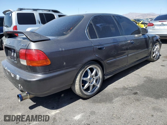 1998 Honda Civic LX with VIN 2HGEJ6673WH515915, listed as a Copart auction lot 52403795 with 224,174 mi miles and Salvage Title. Bid and sale history available at DreamBid. Image 3.