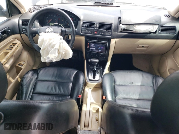 2000 Volkswagen Jetta with VIN 3VWSE29M7YM028198, listed as a Copart auction lot 73648504 with 265,184 mi miles and Salvage title. Bid and sale history available at DreamBid. Image 8.