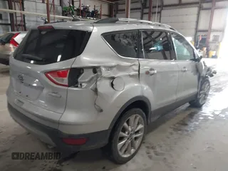 2016 Ford Escape SE with VIN 1FMCU0GX6GUB91605, listed as a IAAI auction lot 41640981 with 130,517 mi miles. Bid and sale history available at carsss.com. Image 4.
