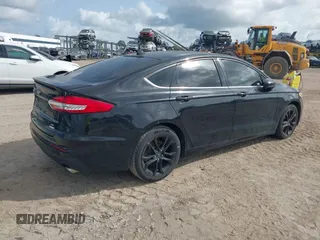 2020 Ford Fusion SE with VIN 3FA6P0HD4LR236433, listed as a IAAI auction lot 42440932 with 94,975 mi miles and . Bid and sale history available at DreamBid. Image 4.