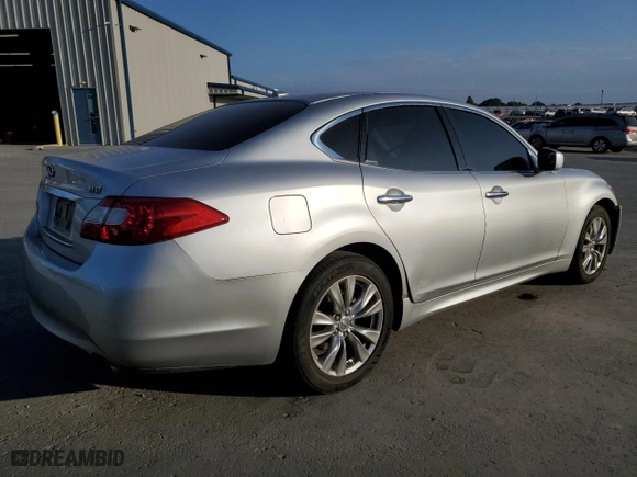 2012 Infiniti M37 with VIN JN1BY1AP9CM336121, listed as a Copart auction lot 71656374 with 125,497 mi miles and Salvage Title. Bid and sale history available at carsss.com. Image 3.