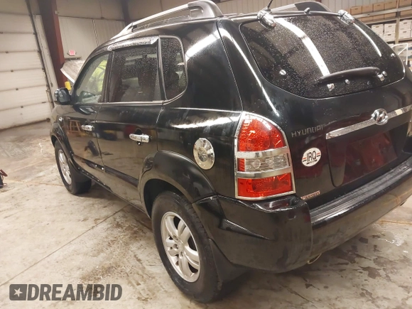 2007 Hyundai Tucson SE with VIN KM8JN12D97U636846, listed as a IAAI auction lot 41818368 with 199,996 mi miles. Bid and sale history available at carsss.com. Image 3.
