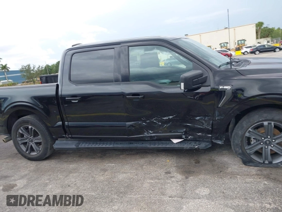 2023 Ford F-150 XL with VIN 1FTEW1C52PFA90311, listed as a IAAI auction lot 42192960 with Not Provided miles and . Bid and sale history available at DreamBid. Image 13.